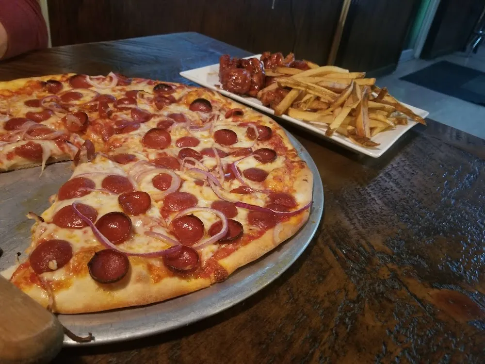 BBQ Boneless Wings and Pepperoni Pizza with Onion